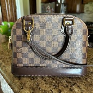 Alma BB Damier Ebene. 9.3x6.9x4.5 inches. Includes strap, lock/key, bustbag/box.